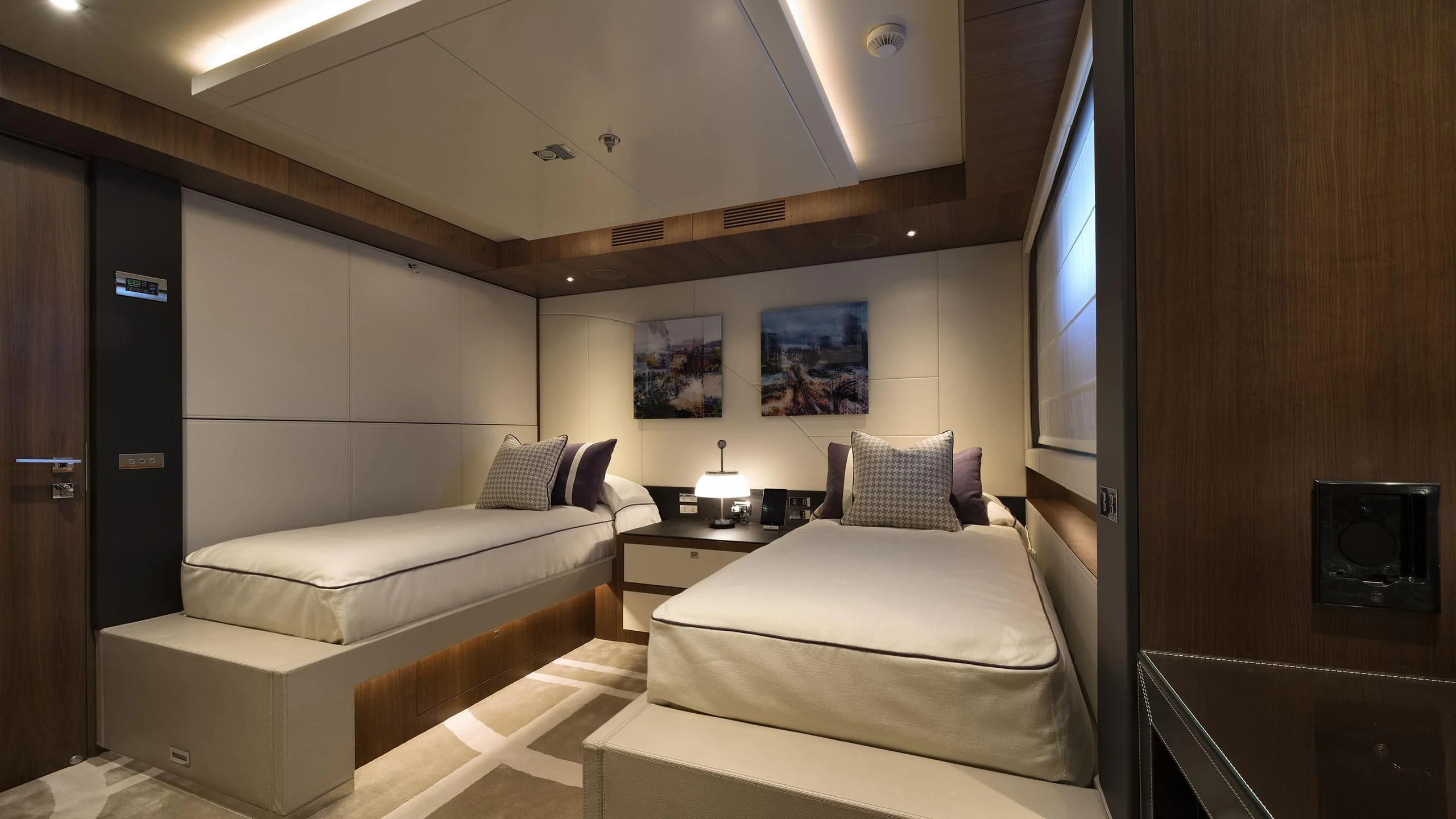 a room with two beds aboard TALEYA Yacht for Sale