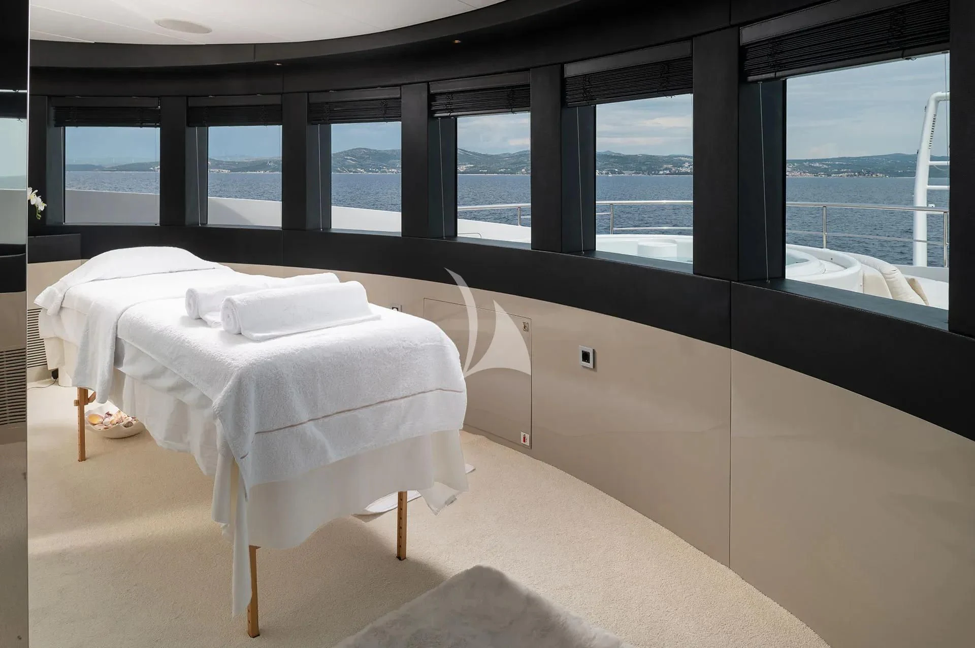 a bed in a room aboard TALEYA Yacht for Sale