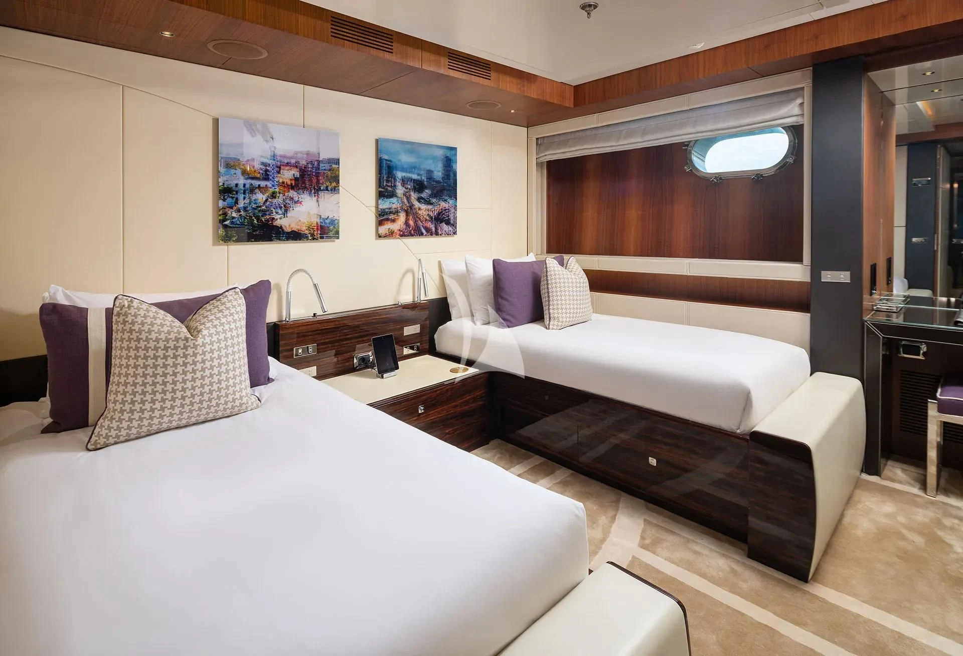 a room with two beds aboard TALEYA Yacht for Sale