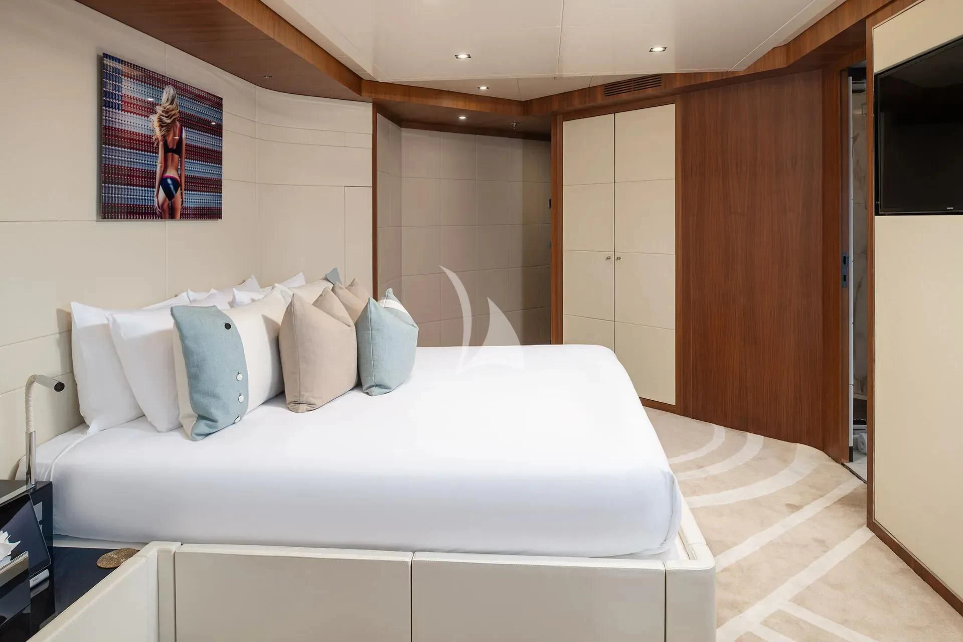 a bed with white sheets aboard TALEYA Yacht for Sale