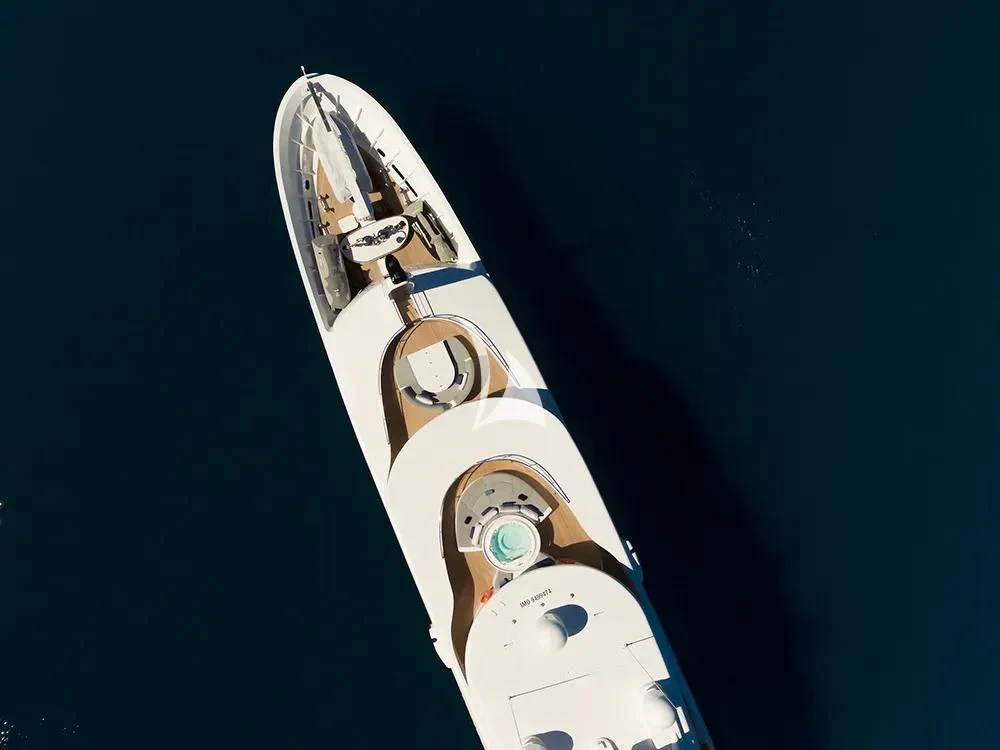 a white and gold guitar aboard TALEYA Yacht for Sale