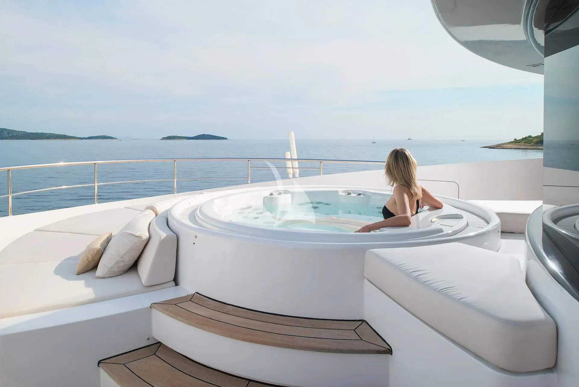 a person sitting in a bathtub aboard TALEYA Yacht for Sale