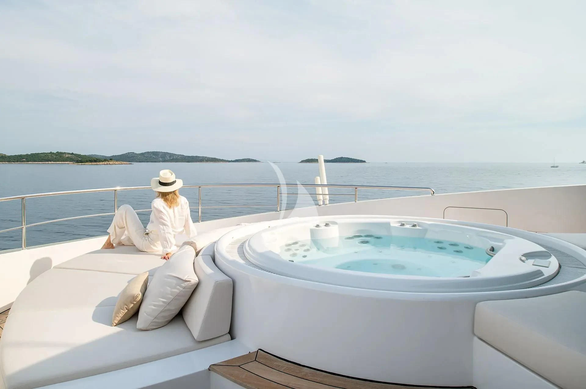 a person sitting on a boat aboard TALEYA Yacht for Sale