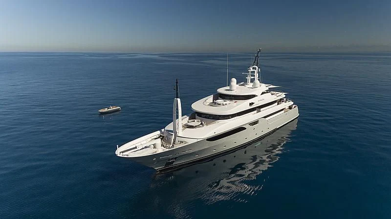 a large white boat in the water aboard TALEYA Yacht for Sale