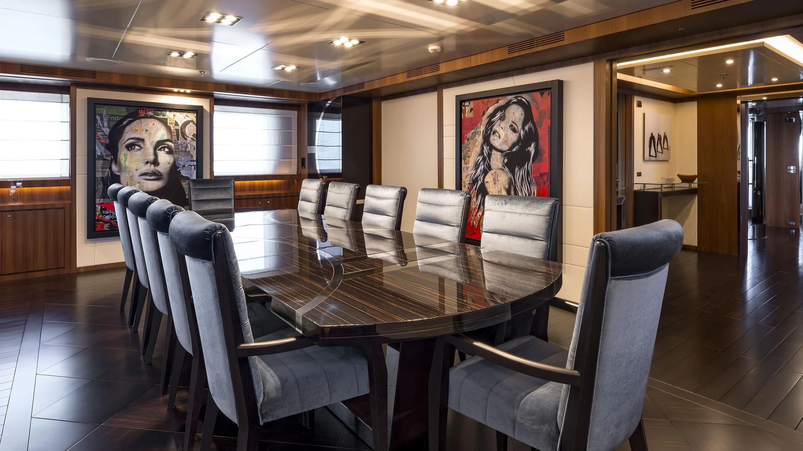 a dining room with chairs aboard TALEYA Yacht for Sale