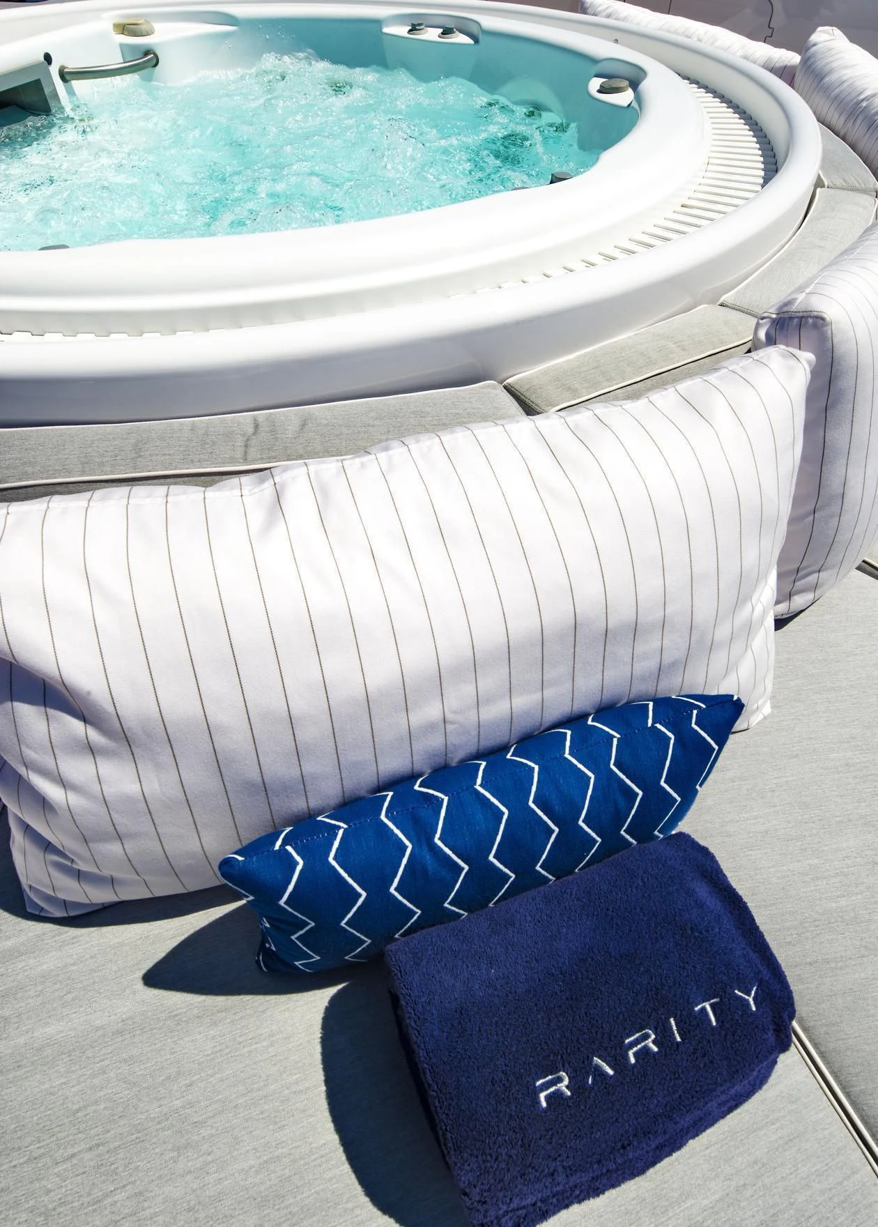 a blue and white baby seat aboard TALEYA Yacht for Sale
