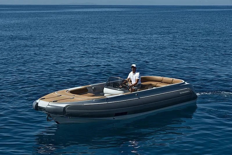a person in a boat aboard TALEYA Yacht for Sale