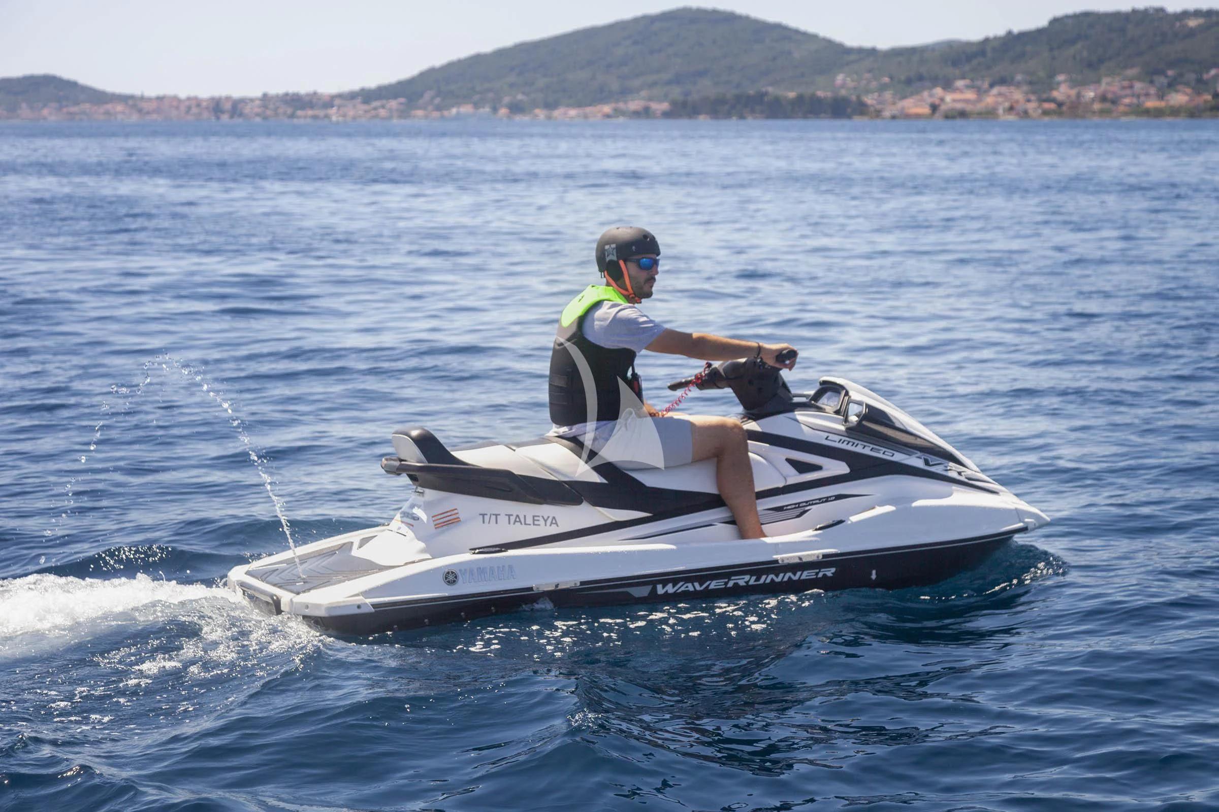 a man on a jet ski aboard TALEYA Yacht for Sale