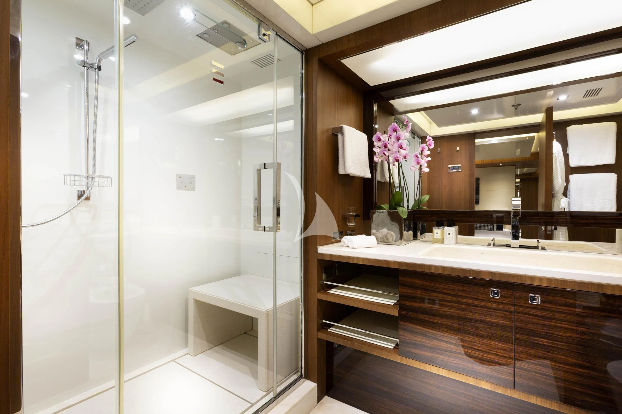 a bathroom with a shower and sink aboard TALEYA Yacht for Sale