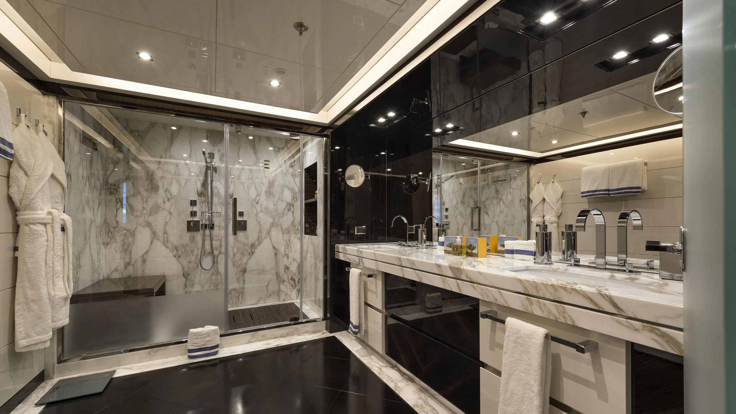 a bathroom with a large marble counter aboard TALEYA Yacht for Sale