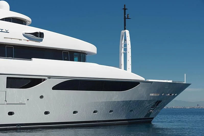 a white yacht on the water aboard TALEYA Yacht for Sale