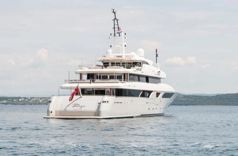 a white boat in the water aboard TALEYA Yacht for Sale