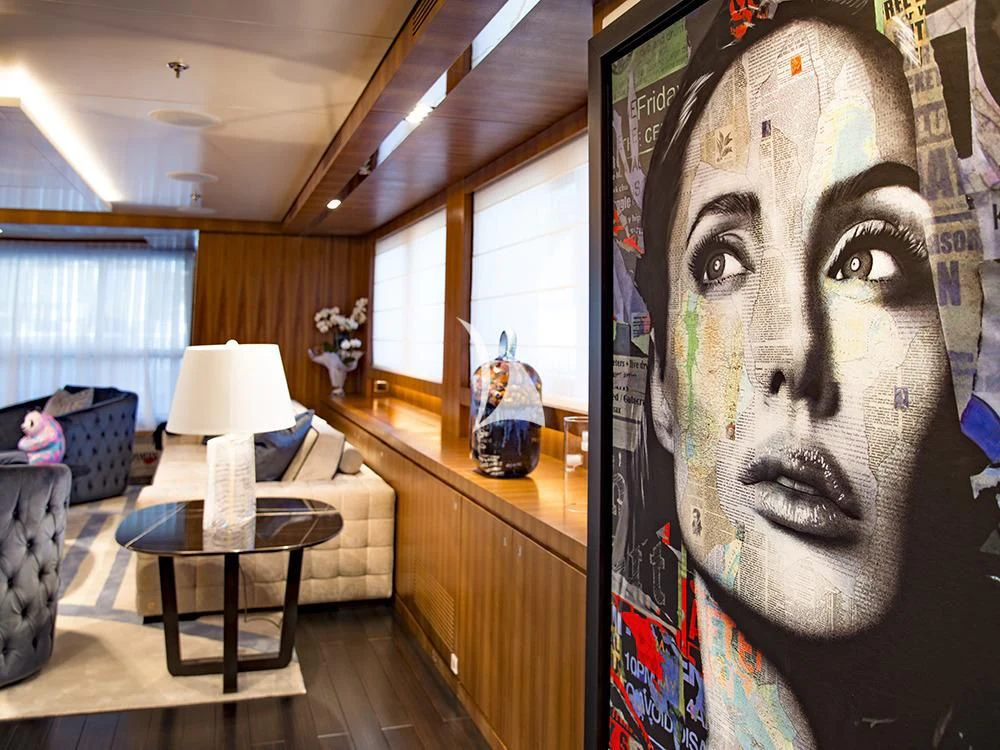 a large painting in a room aboard TALEYA Yacht for Sale