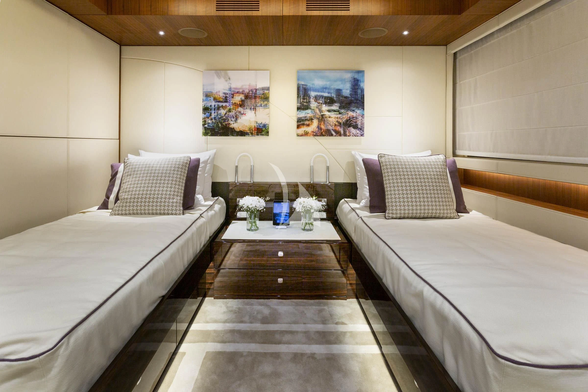a room with two beds aboard TALEYA Yacht for Sale