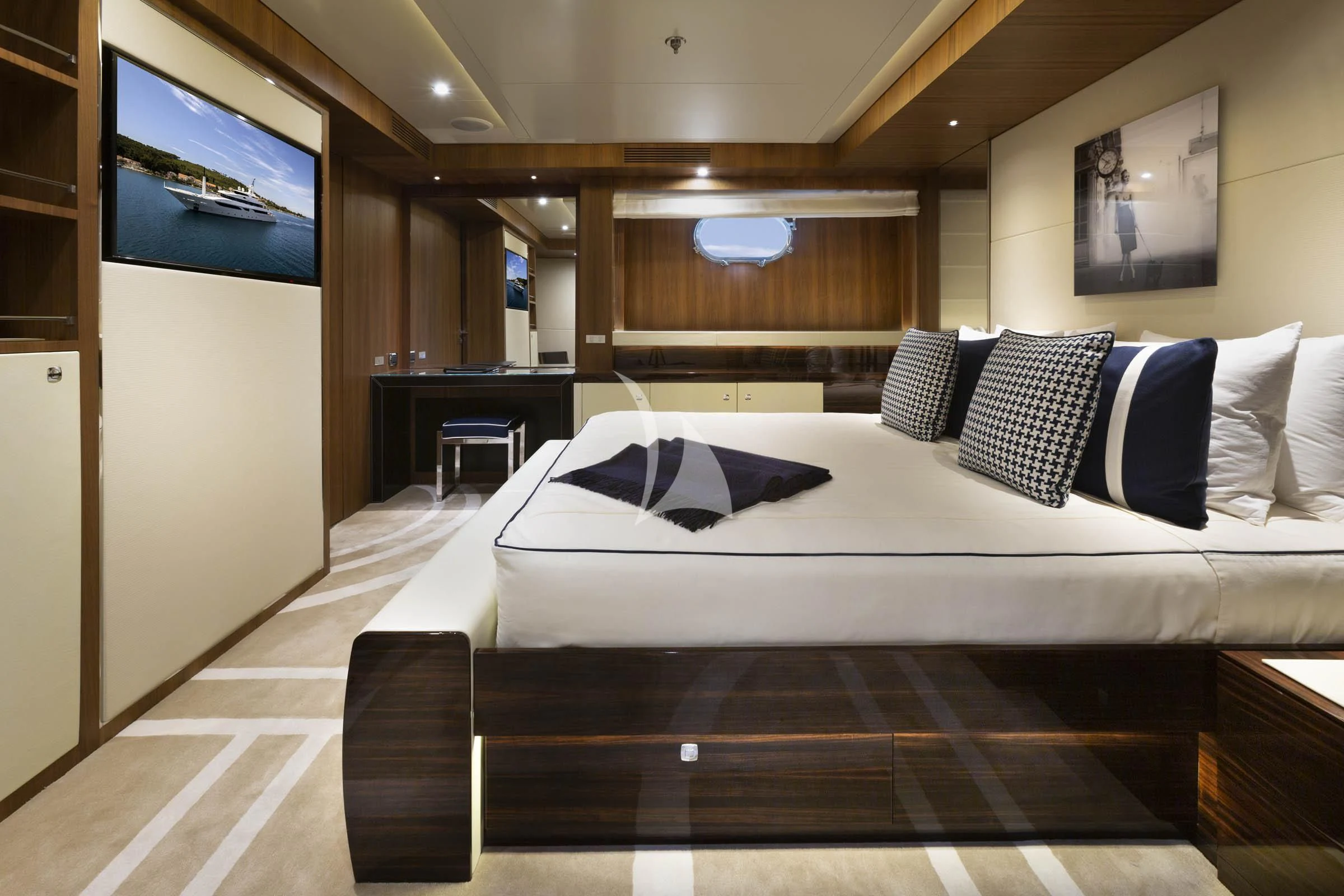 a bed with pillows aboard TALEYA Yacht for Sale