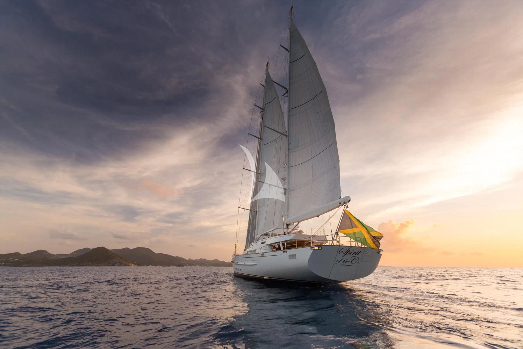 a sailboat on the water aboard SPIRIT OF THE C'S Yacht for Charter