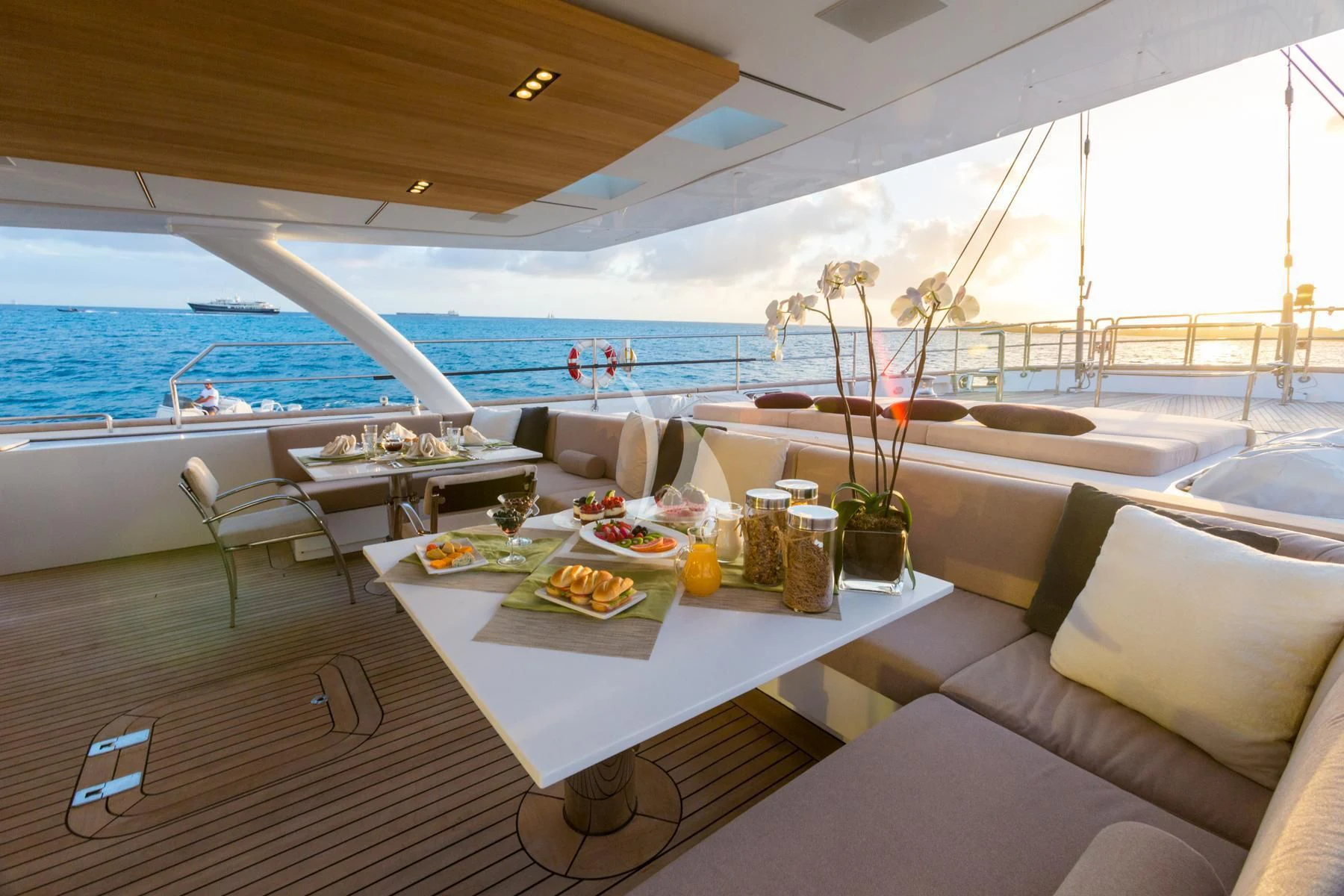 a room with a table and chairs aboard SPIRIT OF THE C'S Yacht for Charter