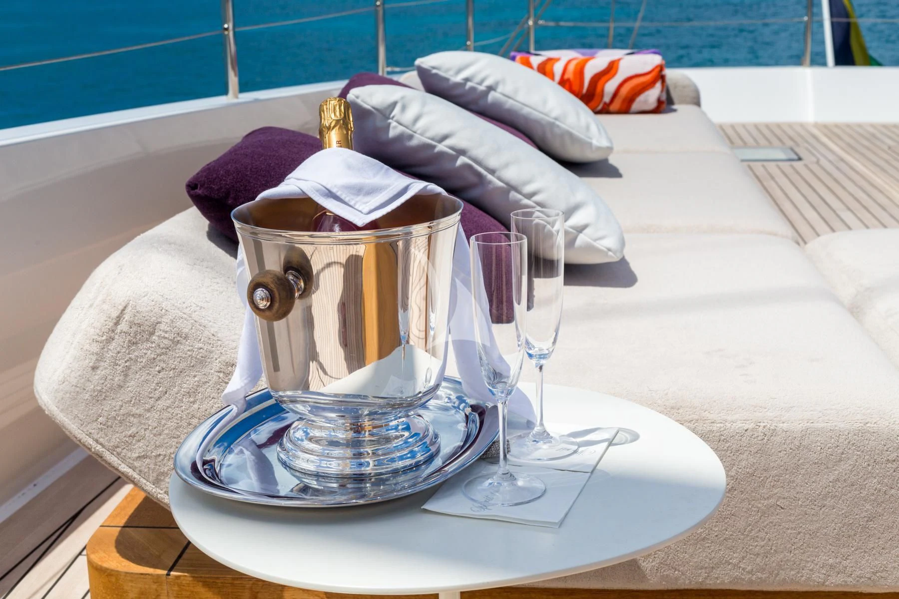a glass of tea on a table aboard SPIRIT OF THE C'S Yacht for Charter