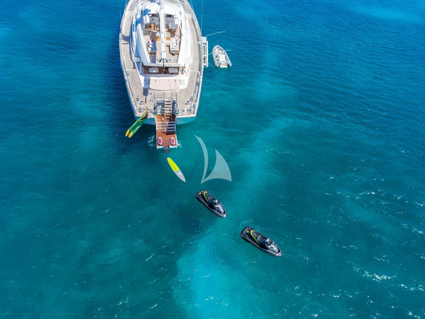 a boat with a group of people on it in the water aboard SPIRIT OF THE C'S Yacht for Charter
