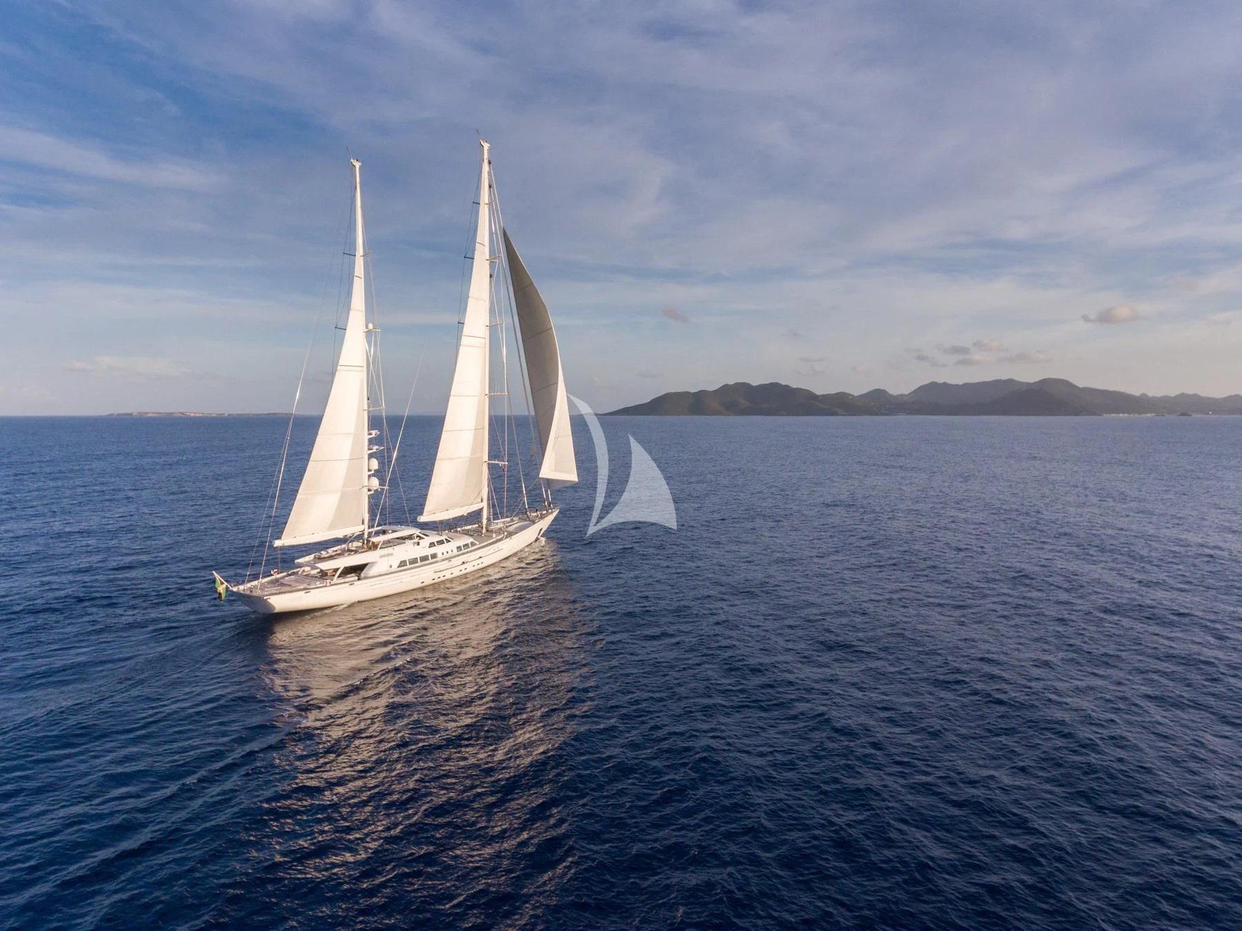 a group of sailboats on the water aboard SPIRIT OF THE C'S Yacht for Charter