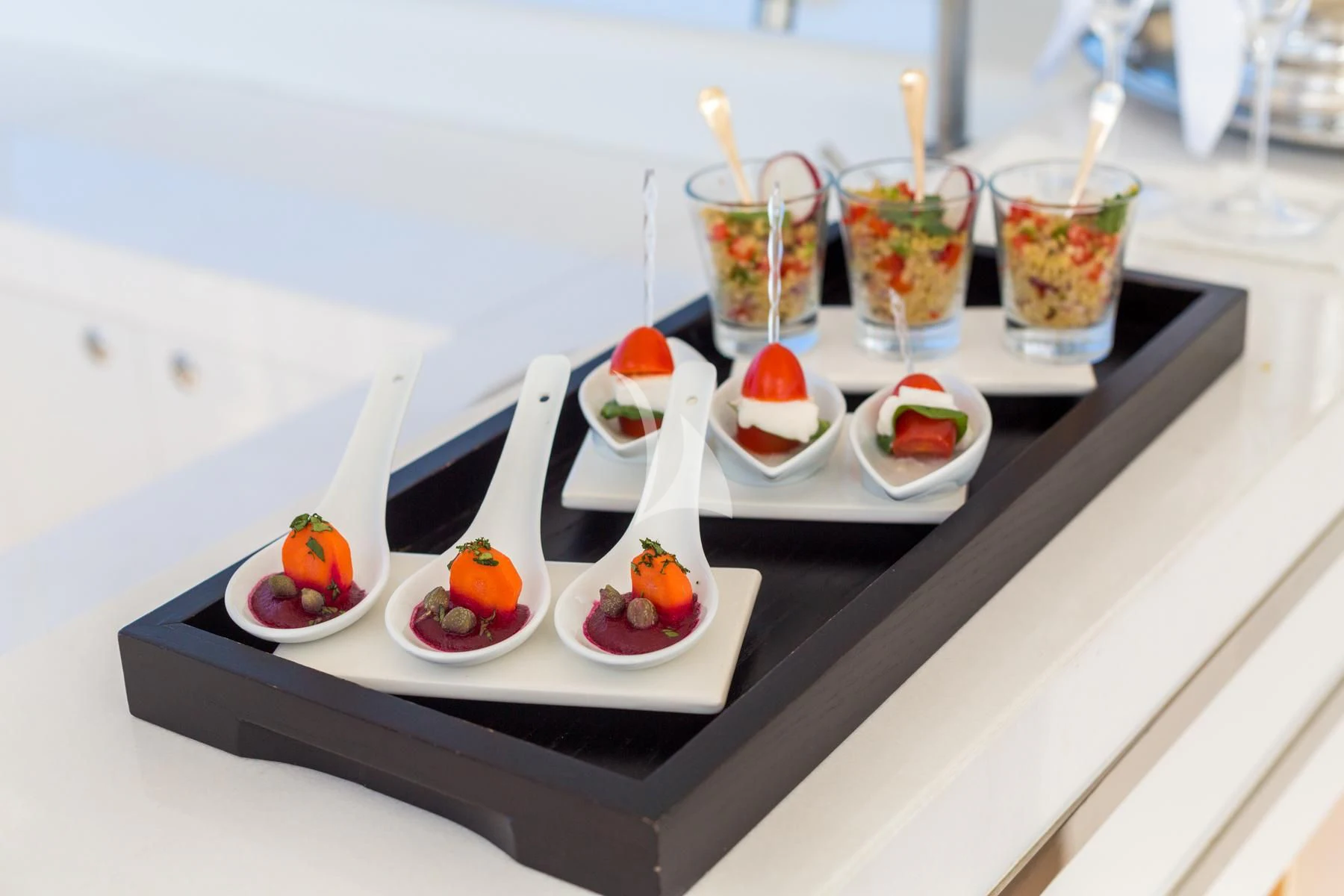 a tray with food on it aboard SPIRIT OF THE C'S Yacht for Charter