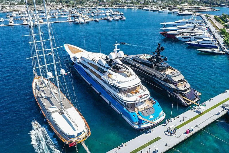 a large ship docked at a port aboard MADAME GU Yacht for Sale