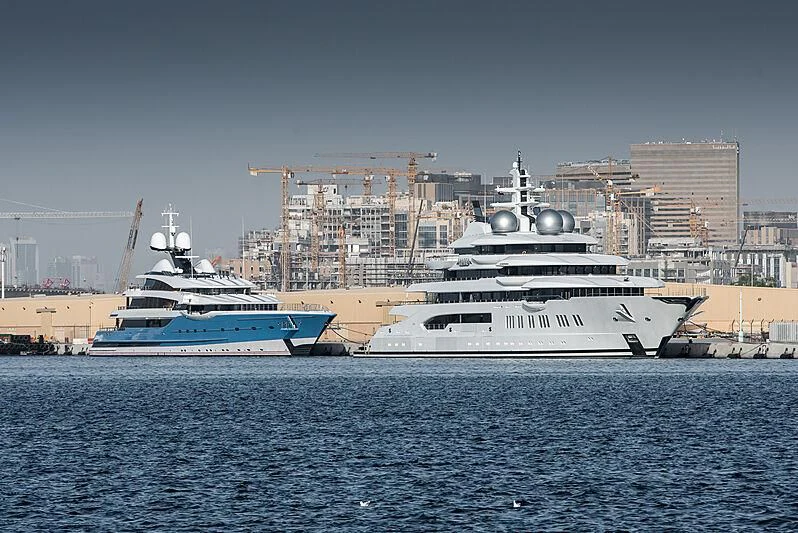 a couple of large ships in the water aboard MADAME GU Yacht for Sale