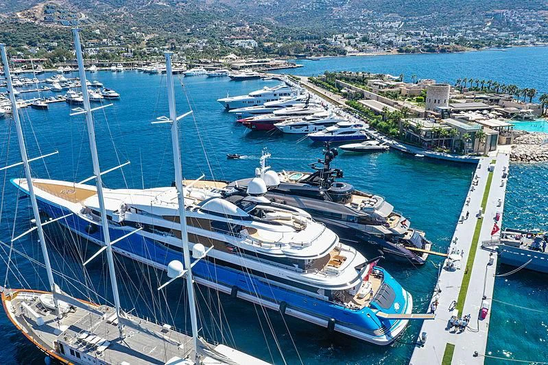 a group of boats are parked in a harbor aboard MADAME GU Yacht for Sale