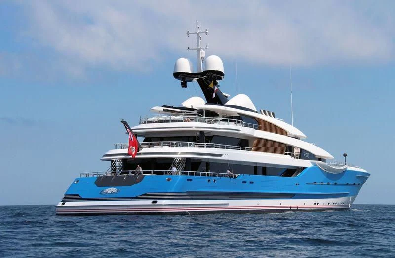 a large white boat in the water aboard MADAME GU Yacht for Sale
