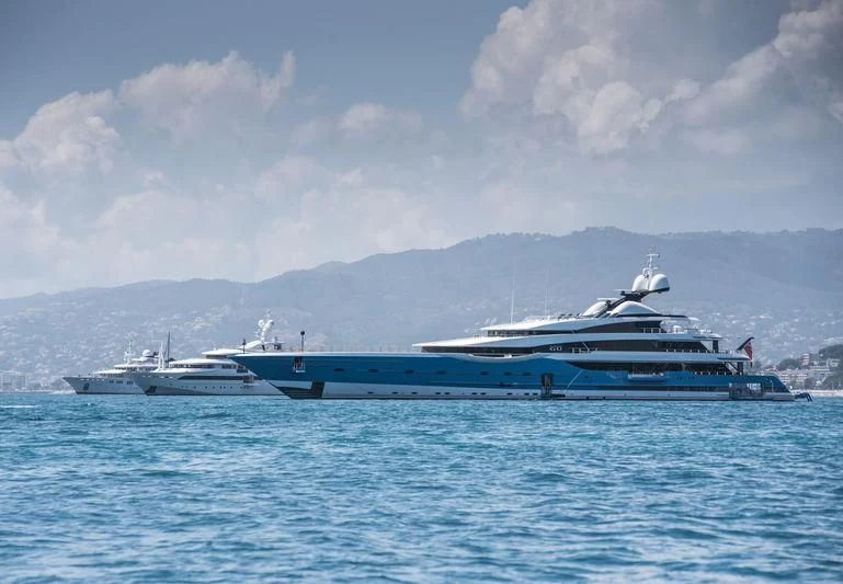 a couple of large boats in the water aboard MADAME GU Yacht for Sale