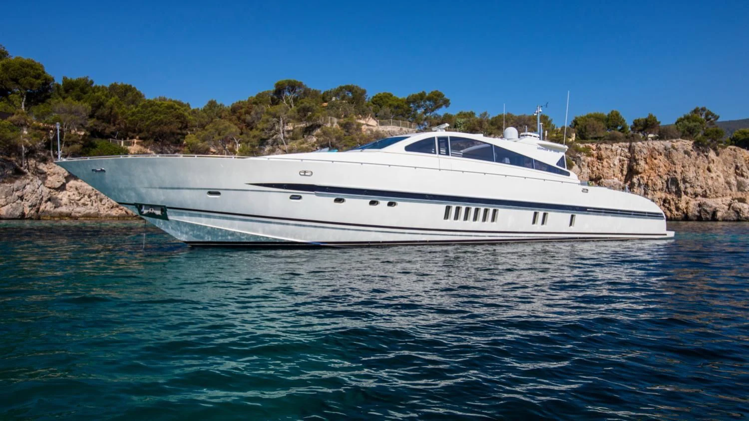 a white yacht in the water aboard CITA Yacht for Sale