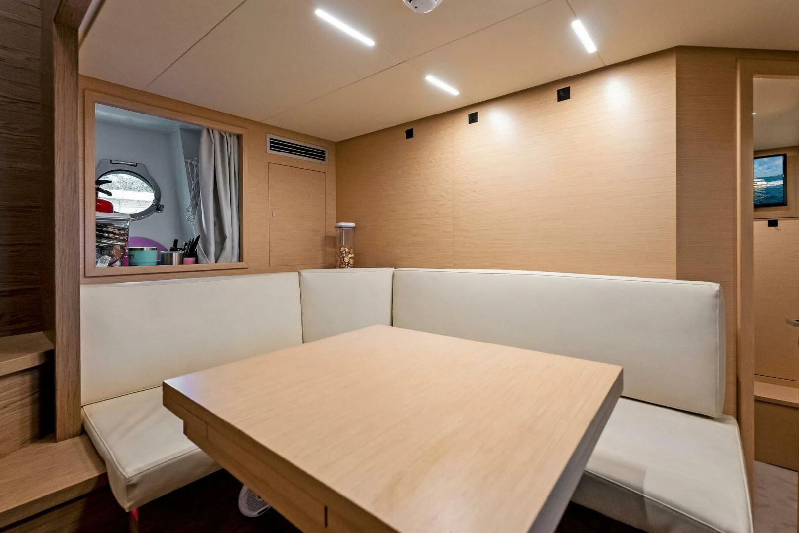 a room with a table and chairs aboard SILHOUETTE Yacht for Sale