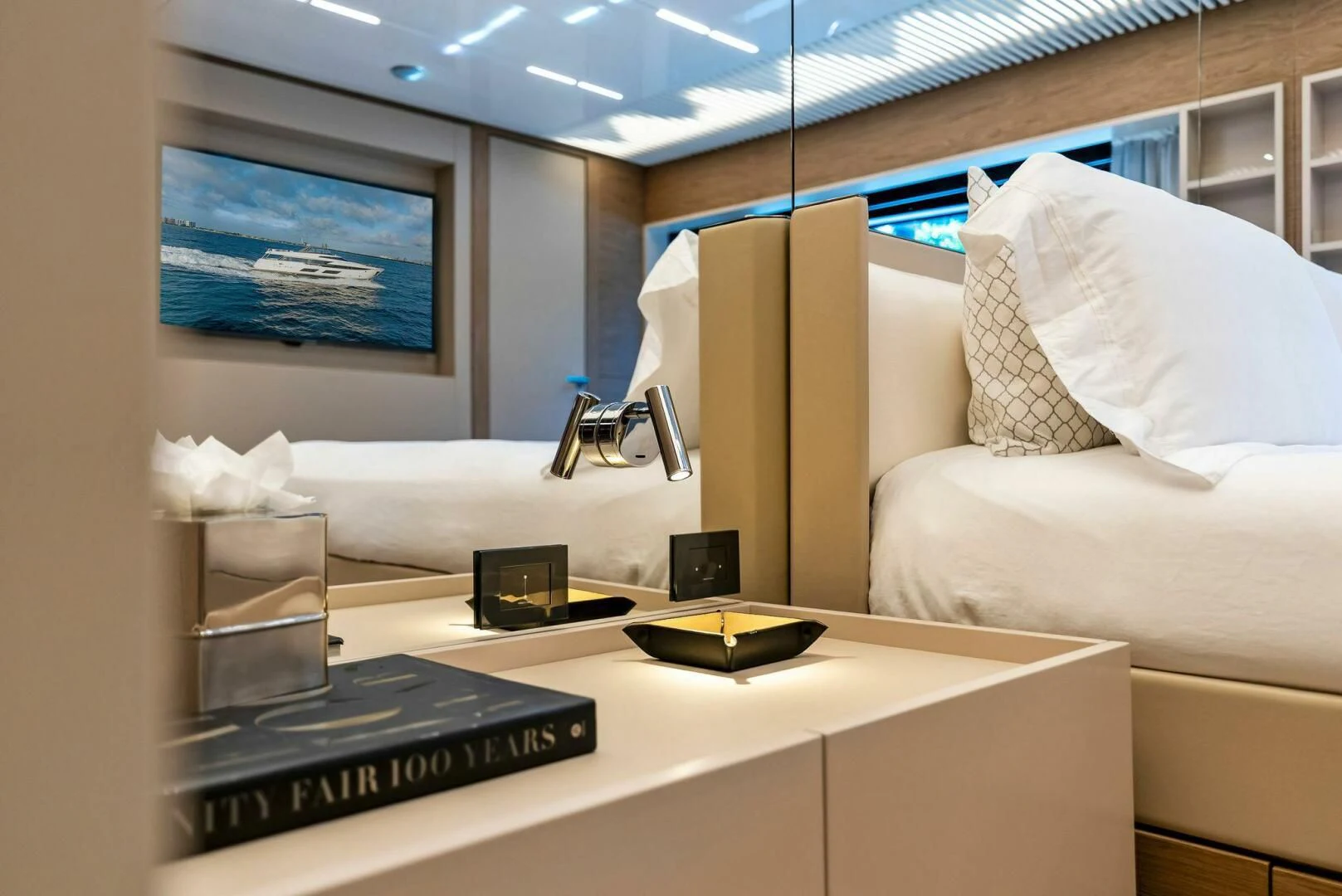 a room with a bed and a laptop on a desk aboard SILHOUETTE Yacht for Sale