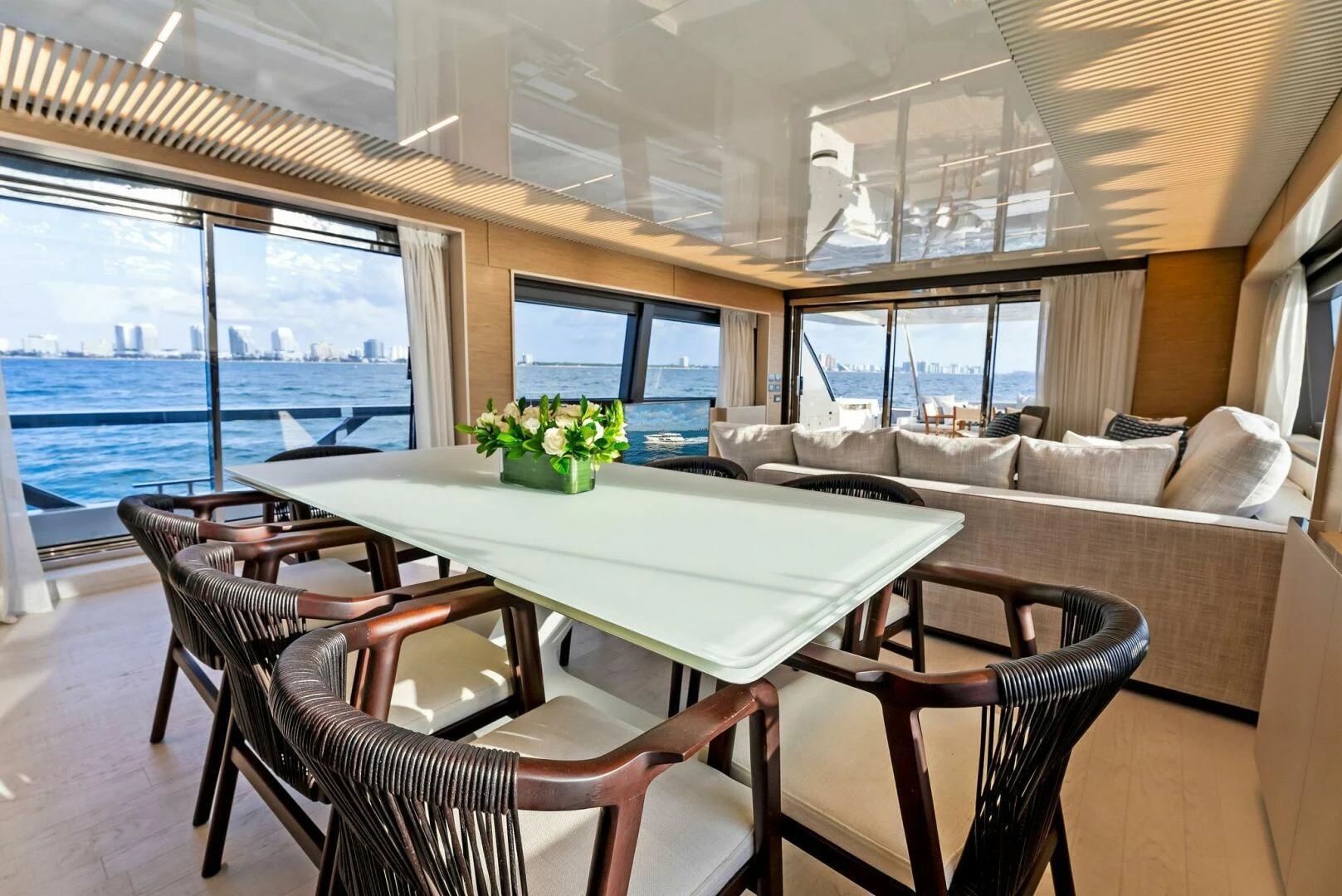 a dining table in a room aboard SILHOUETTE Yacht for Sale