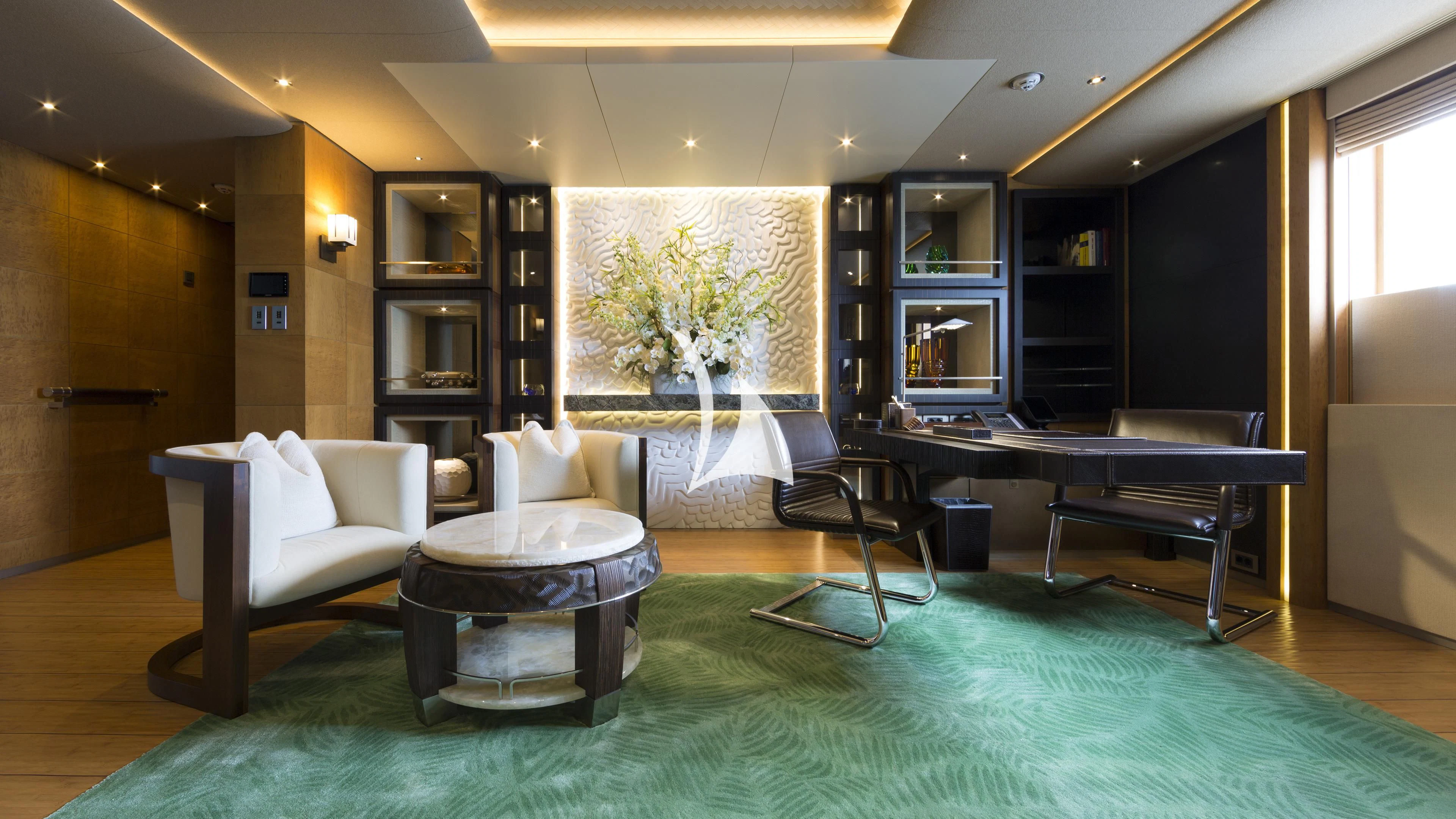 a room with a table and chairs aboard NIRVANA Yacht for Sale