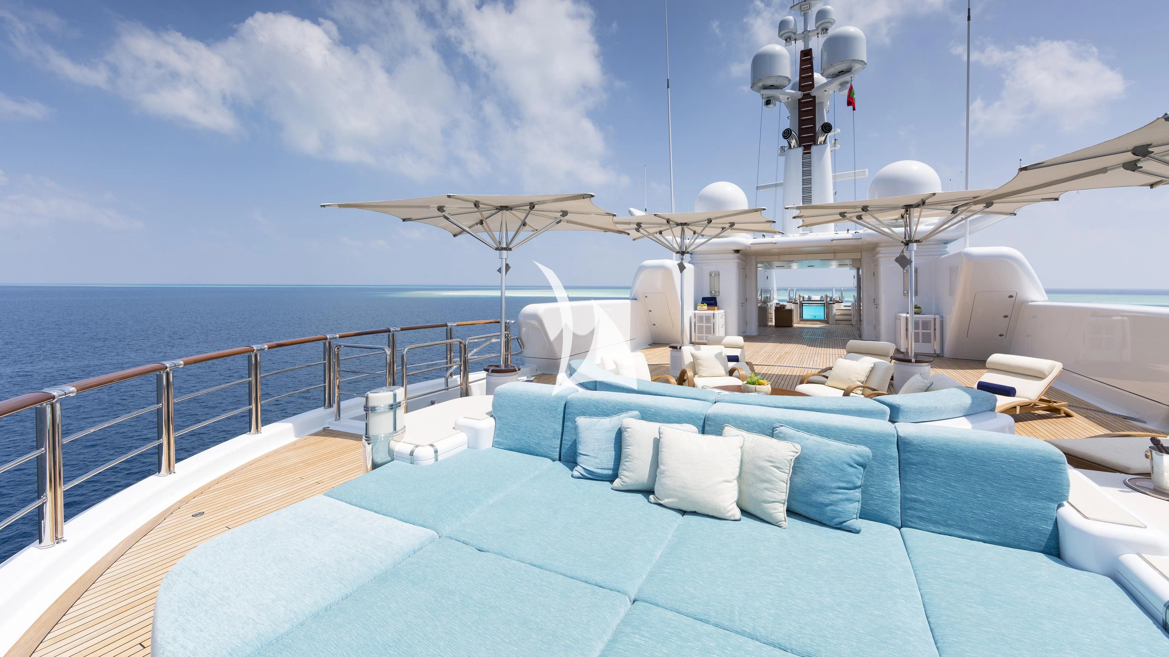 a large boat on a body of water aboard NIRVANA Yacht for Sale