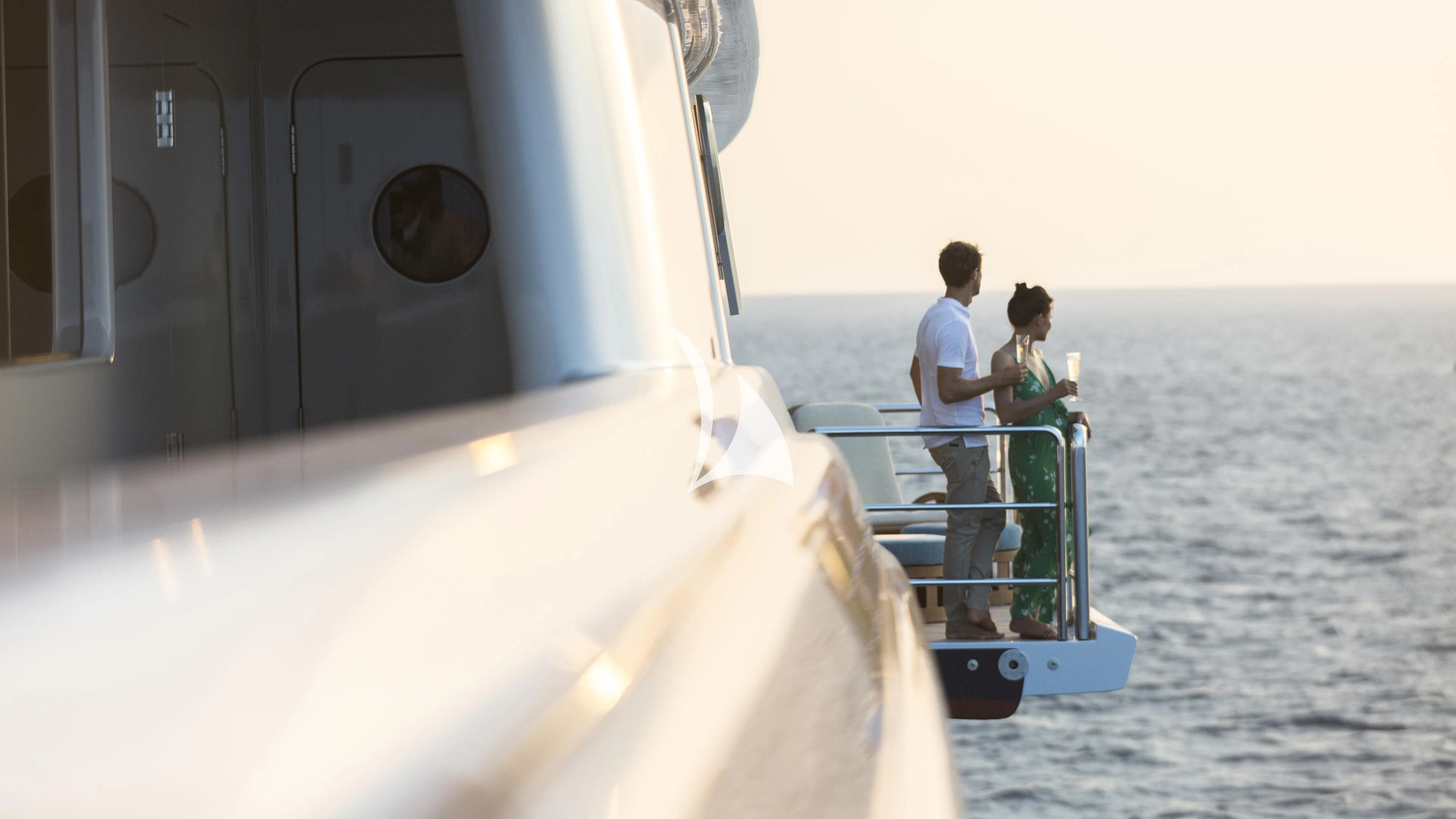 a man and woman on a boat aboard NIRVANA Yacht for Sale