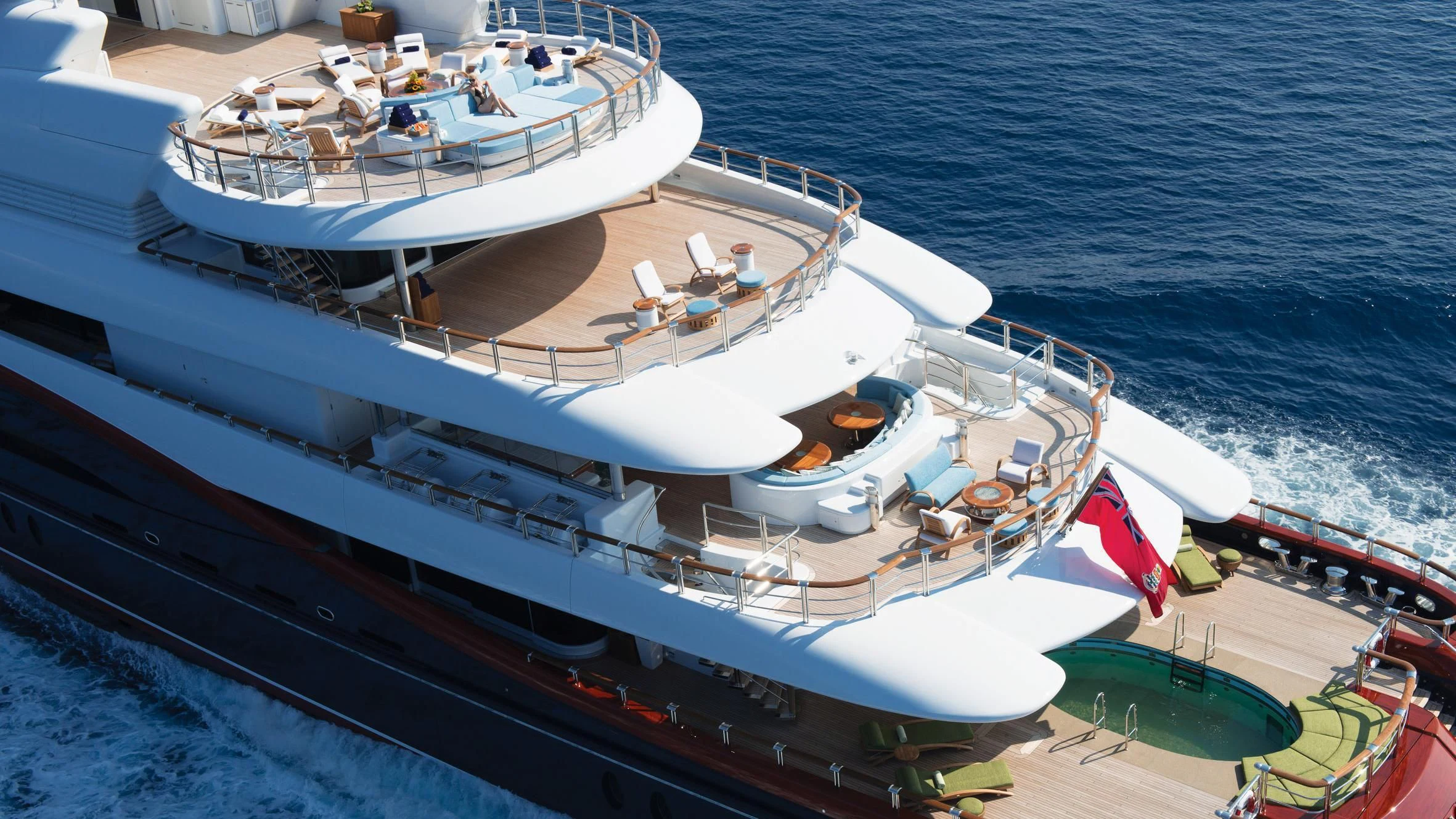 a large ship docked at a port aboard NIRVANA Yacht for Sale