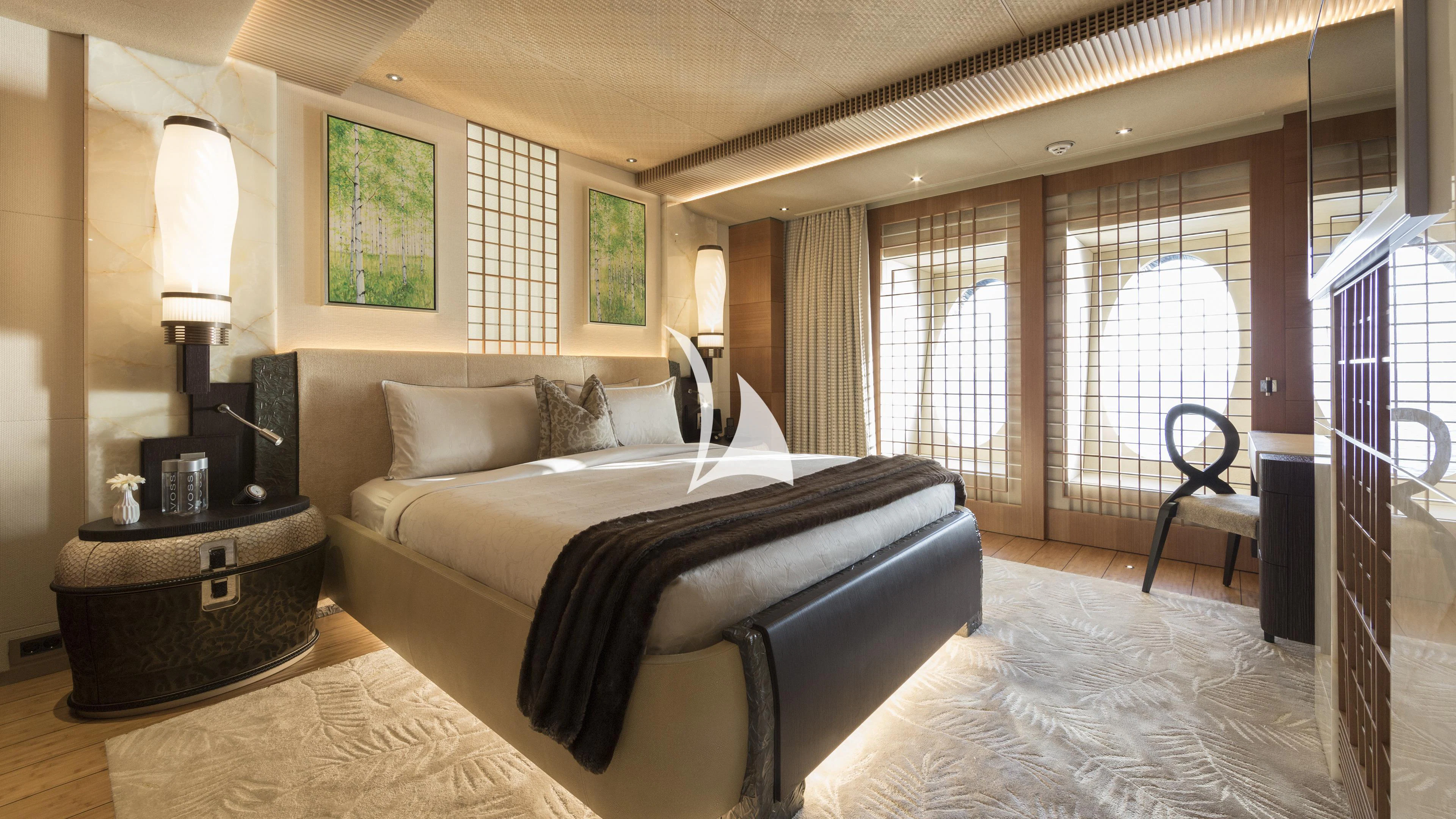 a bed in a room aboard NIRVANA Yacht for Sale