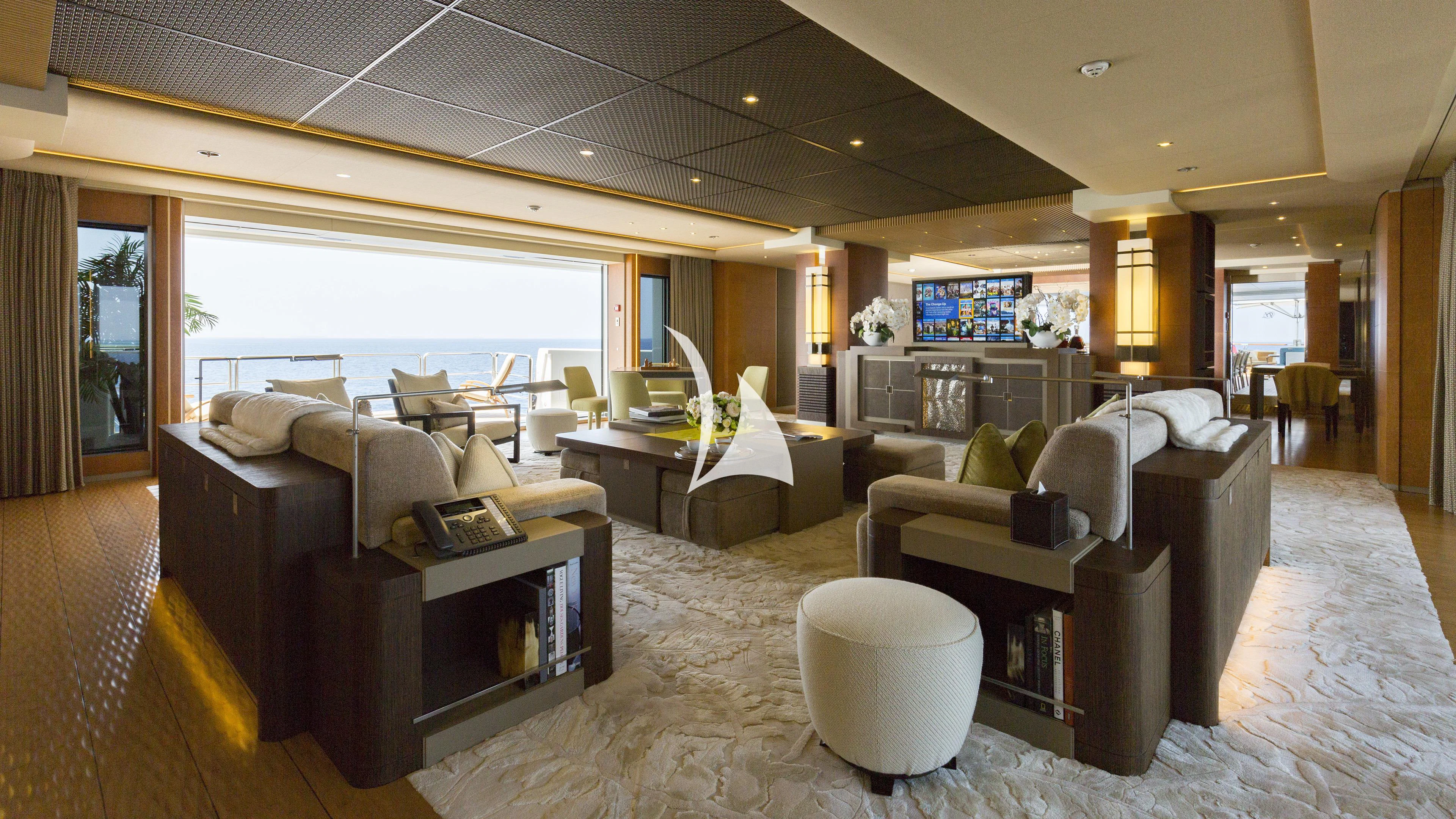 a large room with a bed and a desk aboard NIRVANA Yacht for Sale