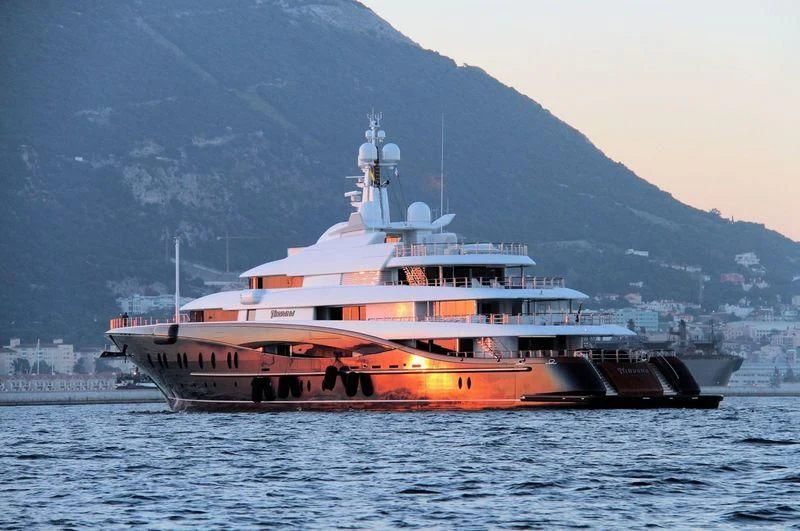 a large ship in the water aboard NIRVANA Yacht for Sale