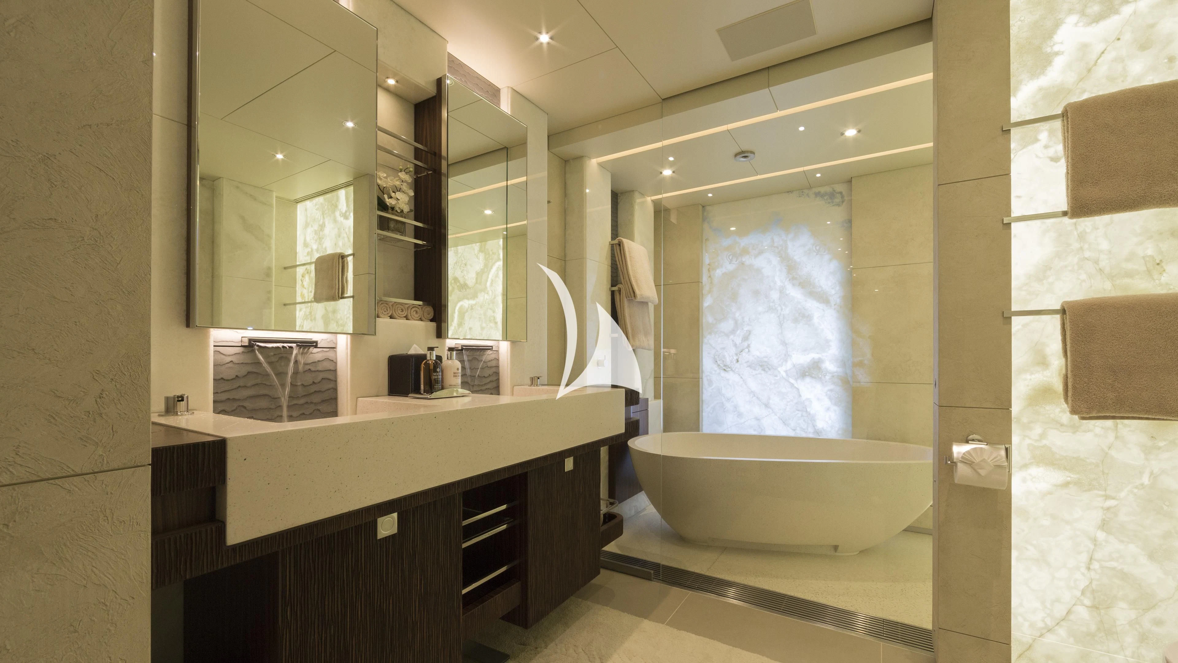 a bathroom with a large bathtub aboard NIRVANA Yacht for Sale