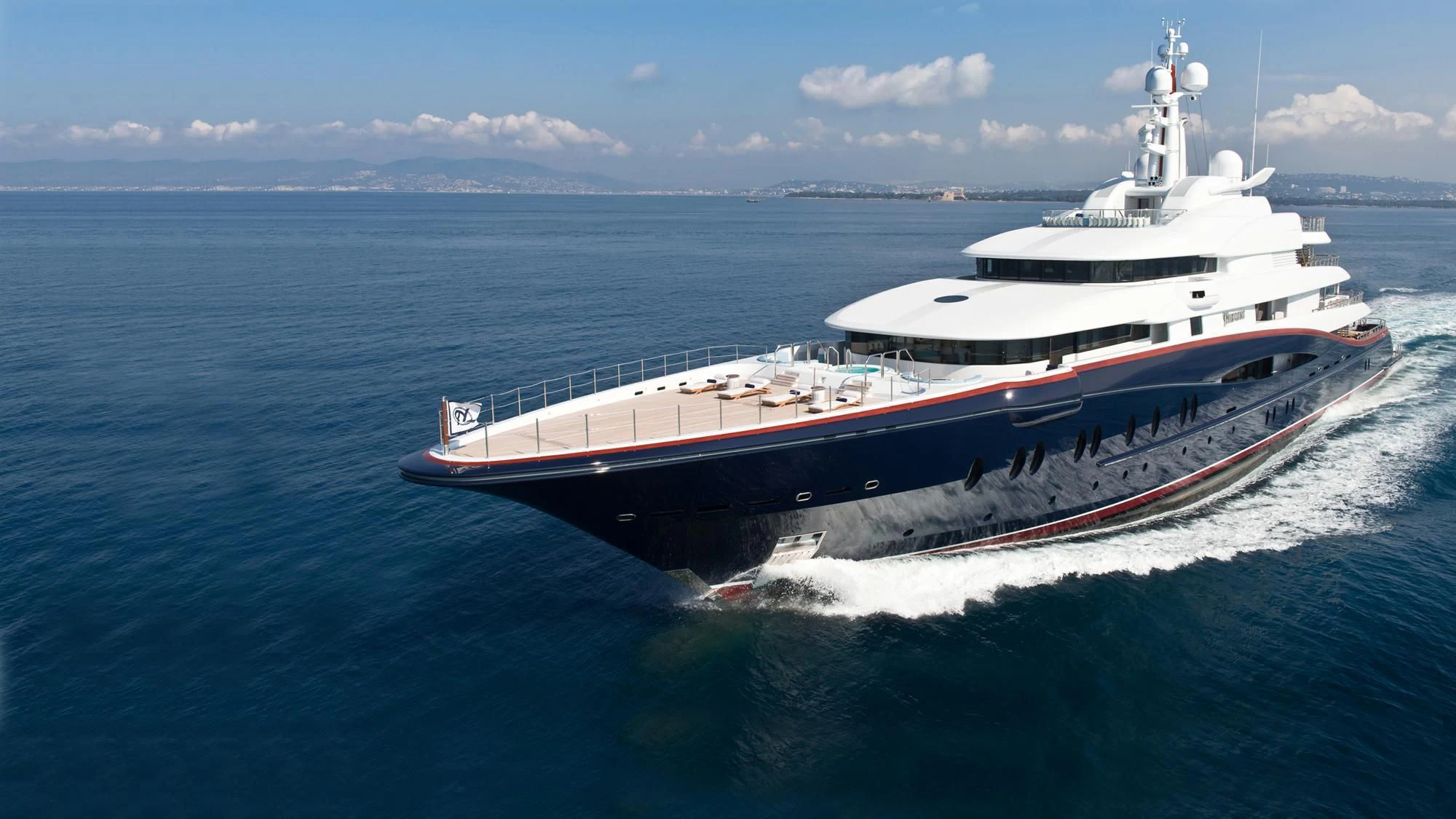 a large ship in the water aboard NIRVANA Yacht for Sale