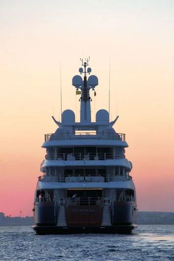 a large ship on the water aboard NIRVANA Yacht for Sale
