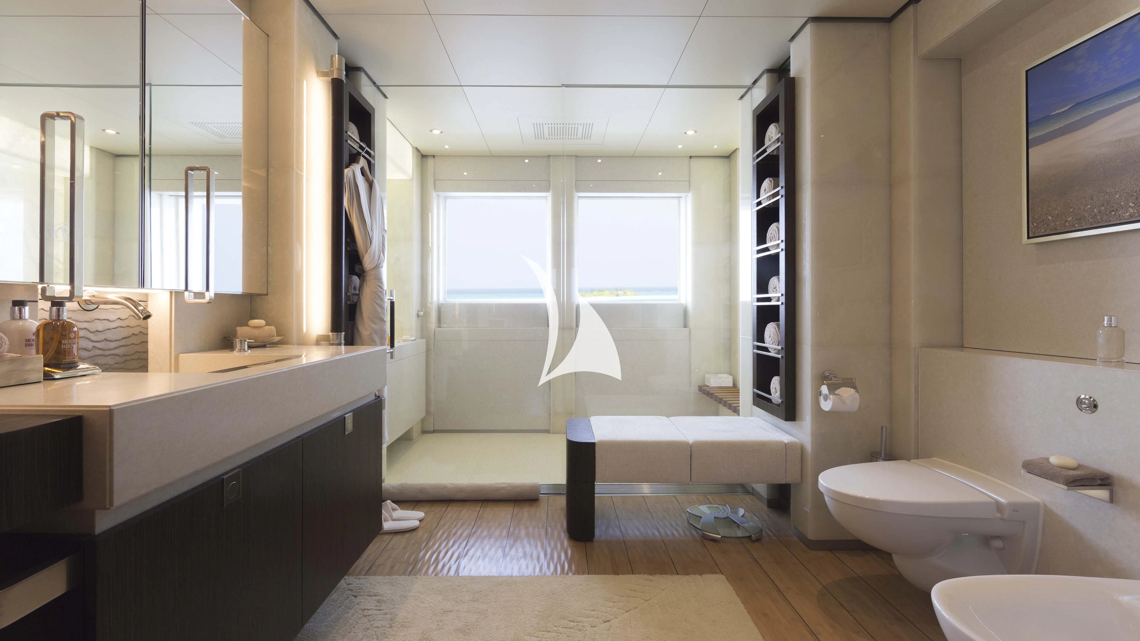 a bathroom with a tub sink and toilet aboard NIRVANA Yacht for Sale