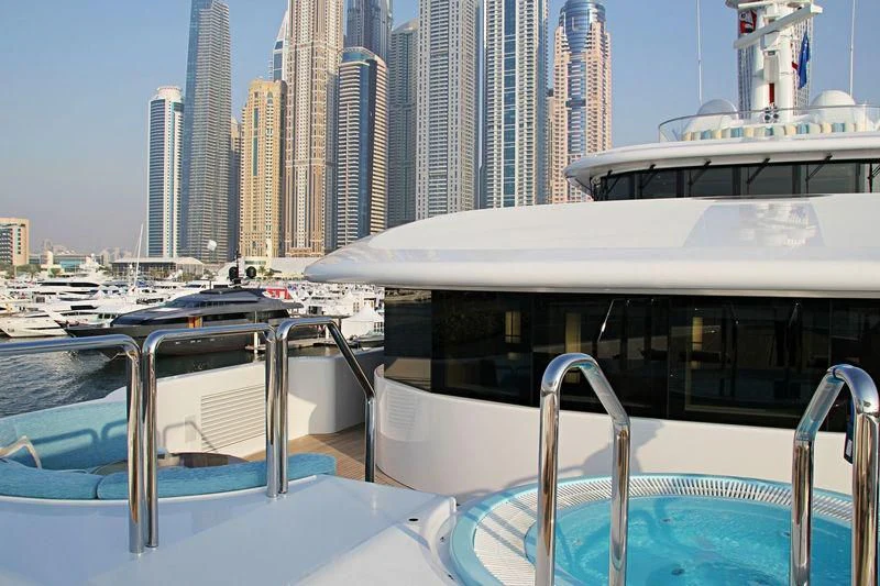 a deck with many boats on it aboard NIRVANA Yacht for Sale