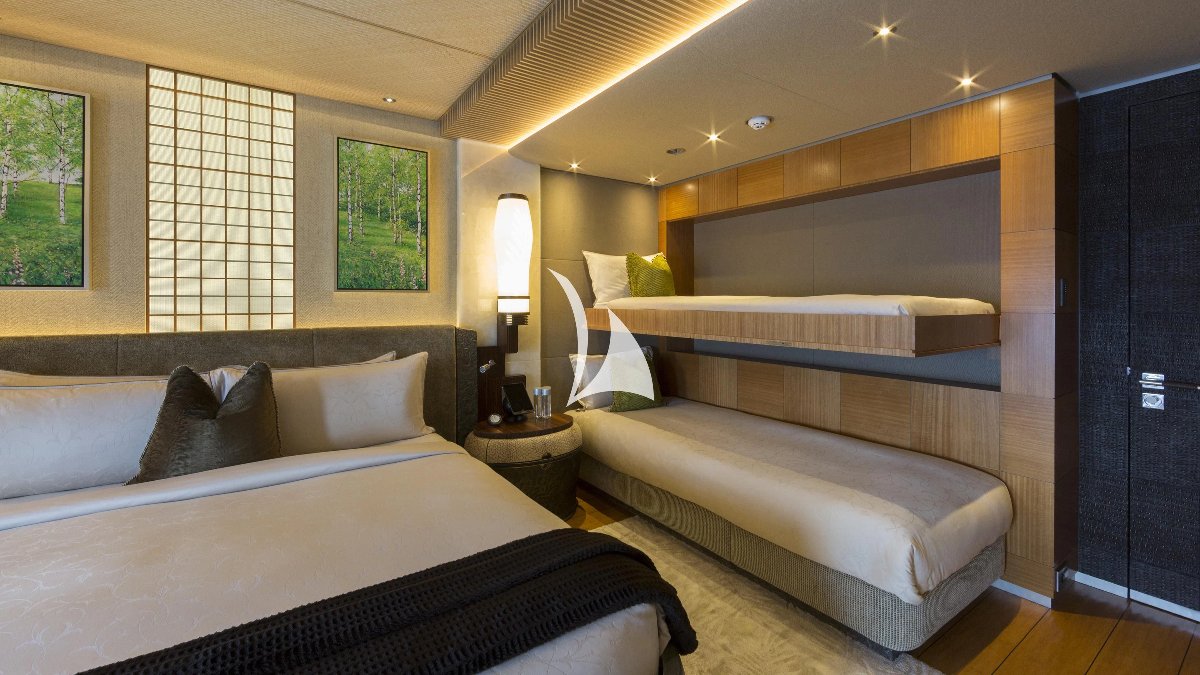 a room with two beds aboard NIRVANA Yacht for Sale