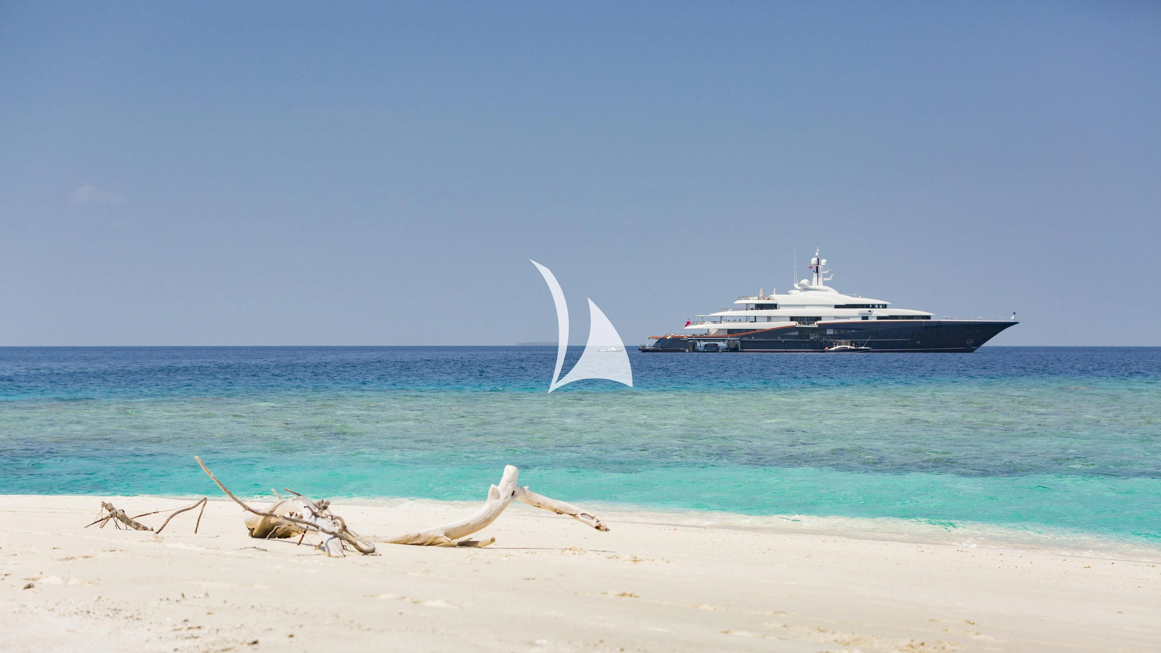 a boat on a beach aboard NIRVANA Yacht for Sale