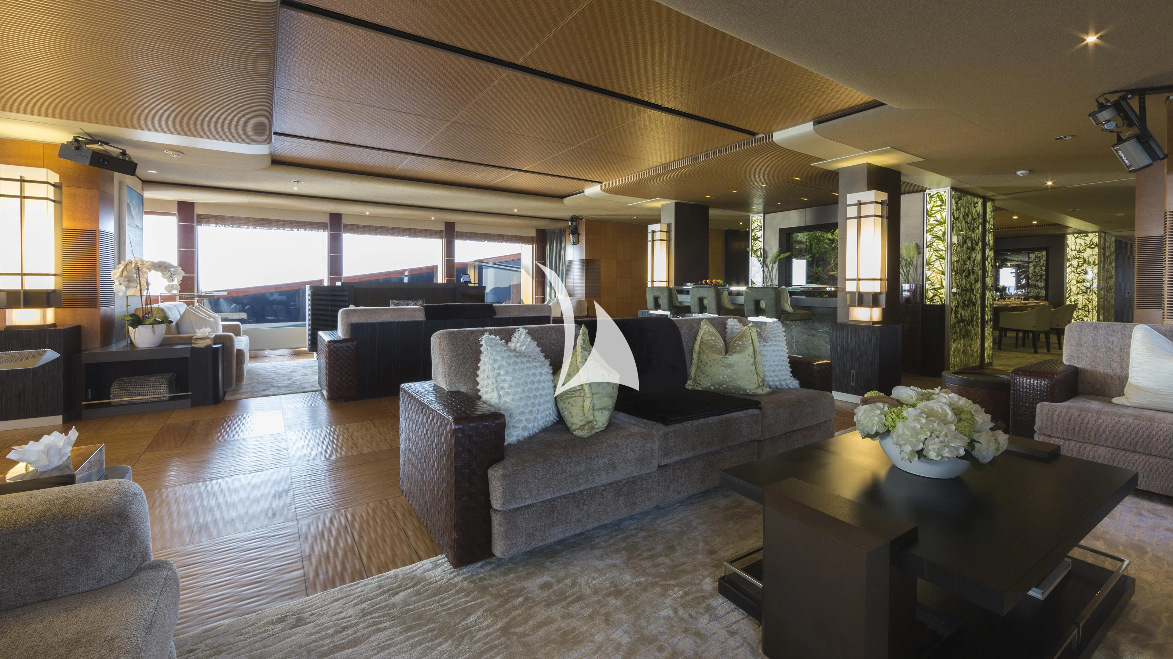 a living room with a large window aboard NIRVANA Yacht for Sale