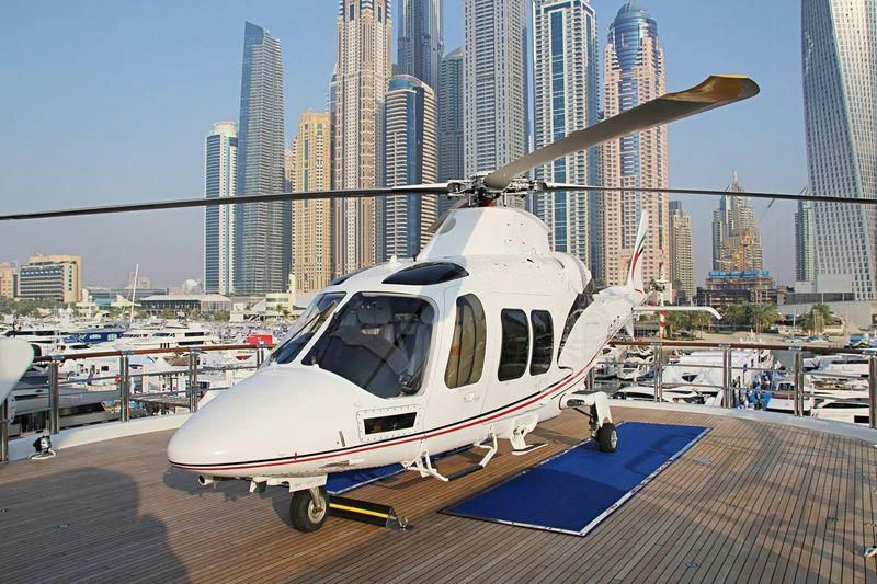 a helicopter on a runway aboard NIRVANA Yacht for Sale